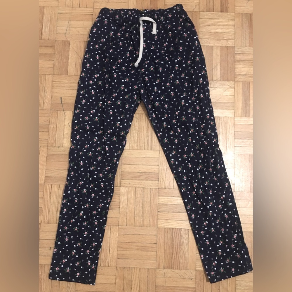 Navy blue floral women’s trousers with pockets